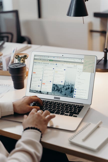 Modern digital workspace with creative professionals working on content creation - representing social media and marketing content development